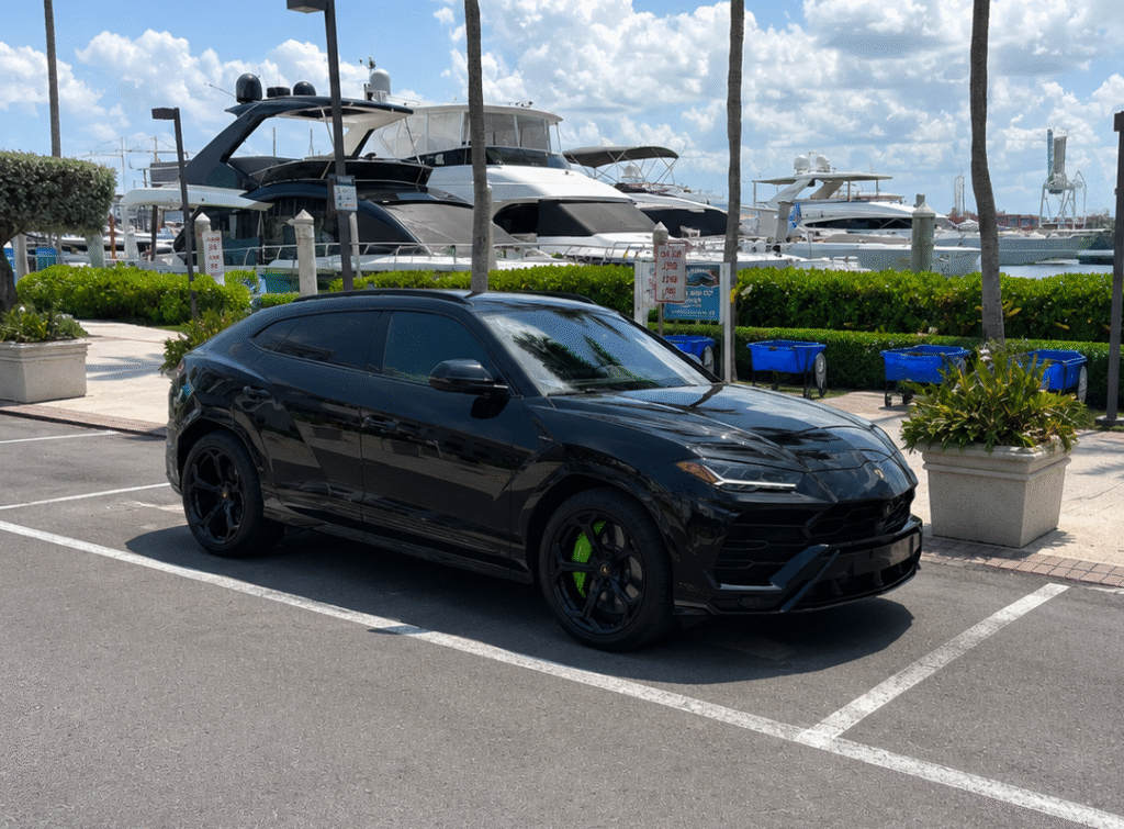 black Lamborghini Urus in Miami,. Exotic Miami Car Rental, EMCR Miami